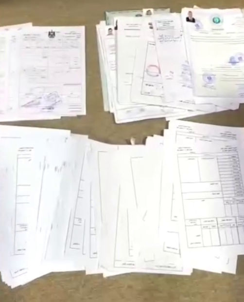 سندات 95 بناية وسجلات على بياض في منزل معاونة تسجيل عقاري صلاح الدين